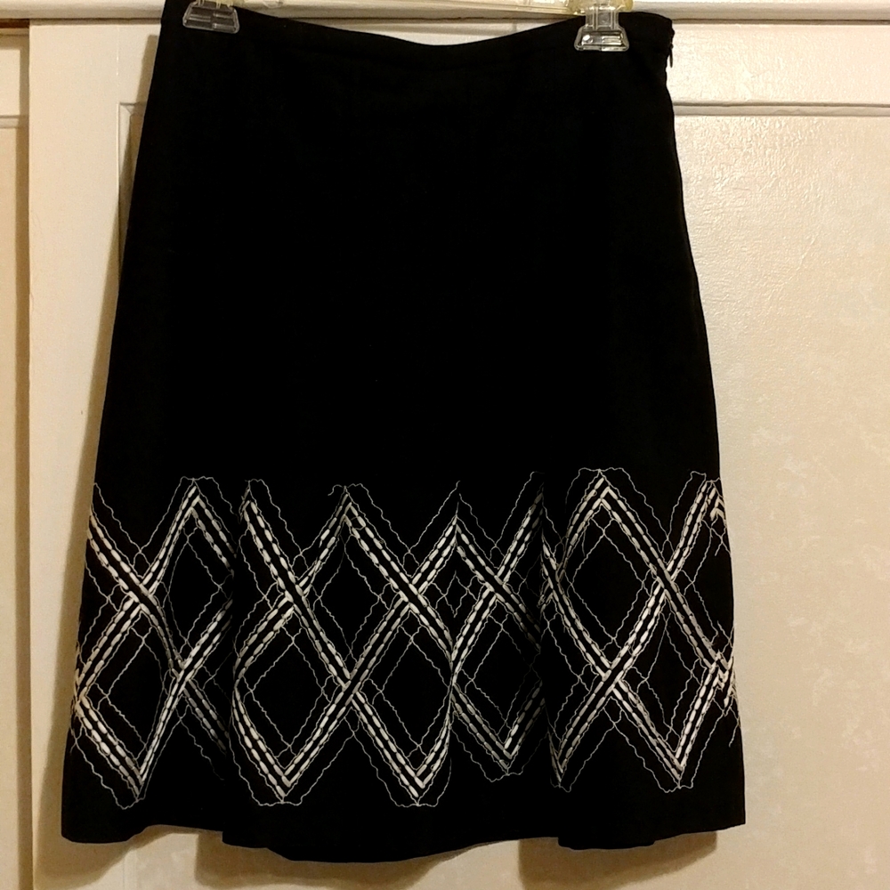Wide pleated A line skirts.